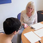 Audiologist and tinnitus patient in discussion